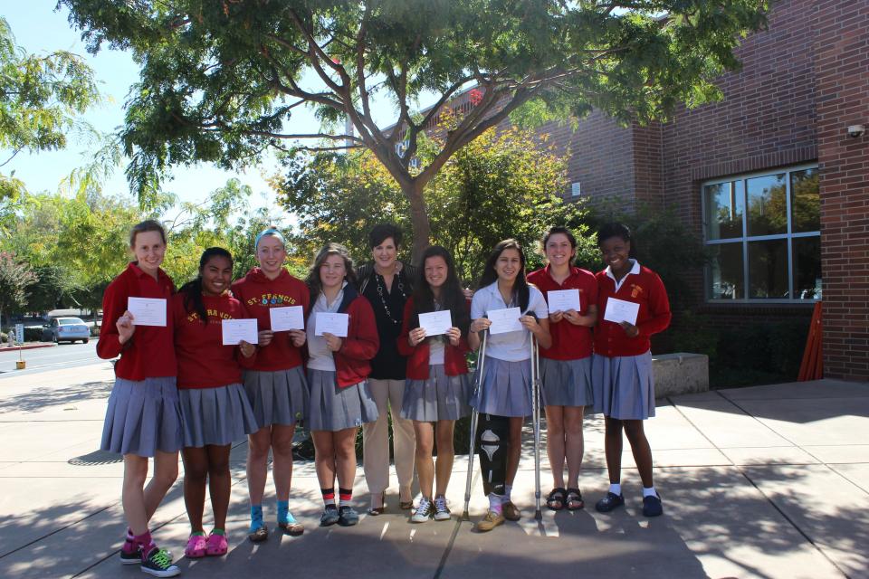 Pictured Left to Right: Marissa, Kristienne, Camerin, Caroline, Principal Theresa Rodgers, India, Alexandra, Mallory, Benite. not pictured: Hannah