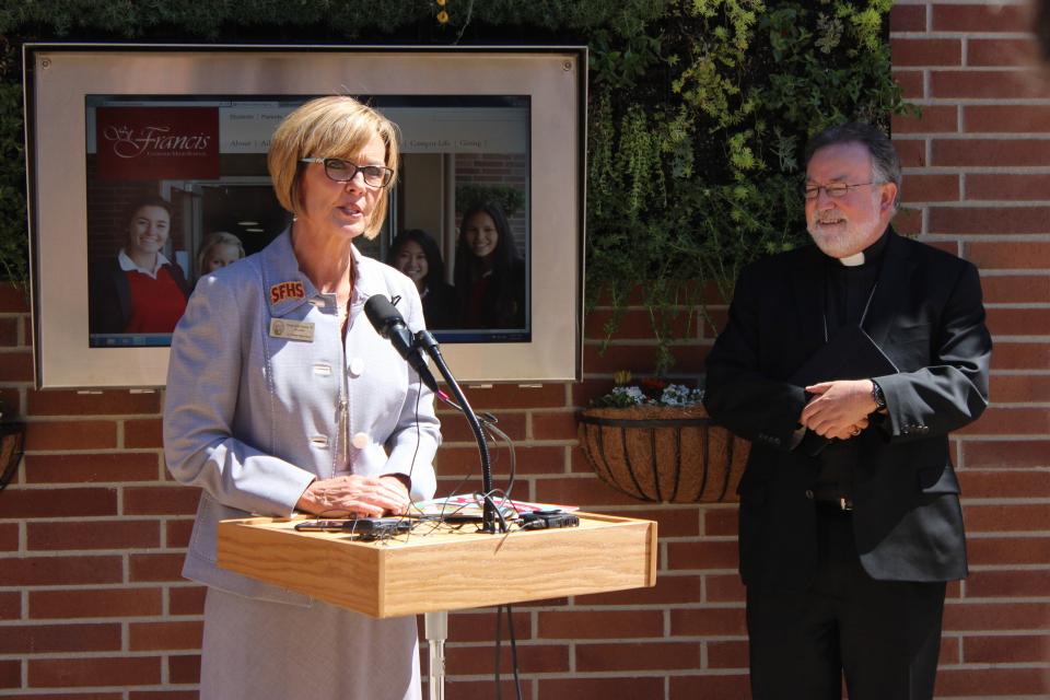 President Margo Reid Brown '81 speaking at Bishop Jaime Soto's Press Conference