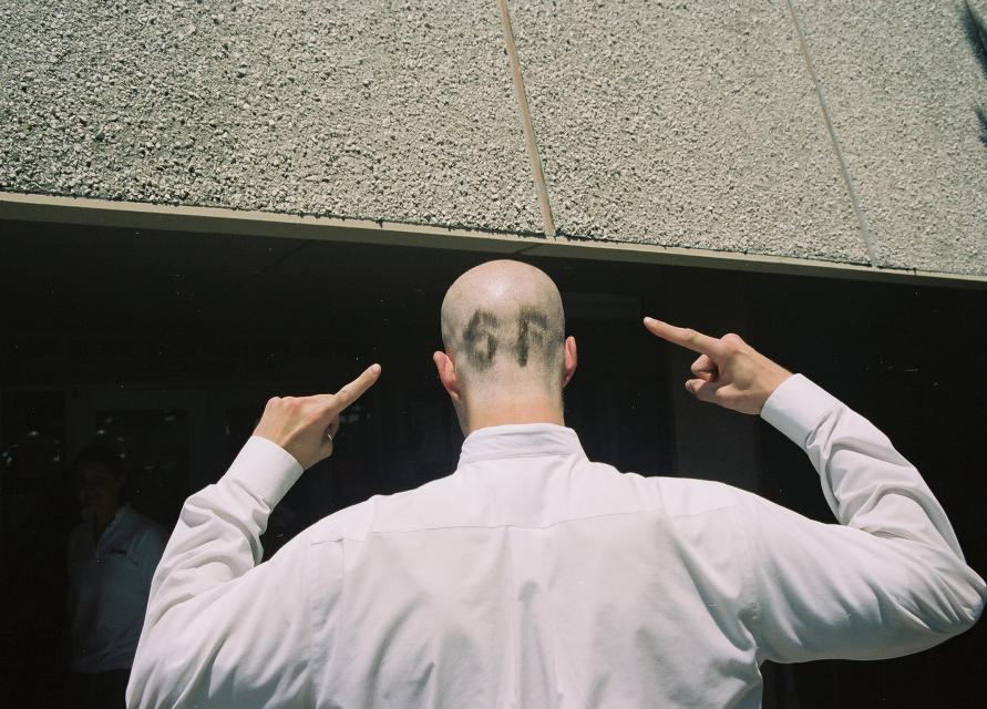 Showing his SF Pride, after donating his hair to Locks of Love